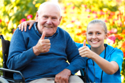 caregiver and client doing a OK sign